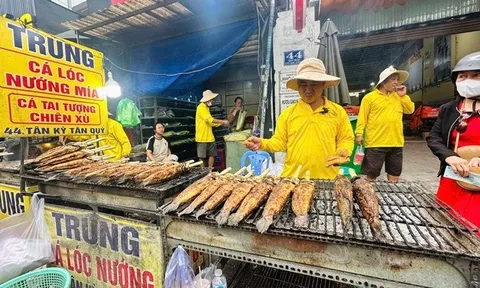 Nhộn nhịp mua bán tại “Phố cá lóc nướng” lớn nhất Tp.HCM dịp Vía Thần Tài